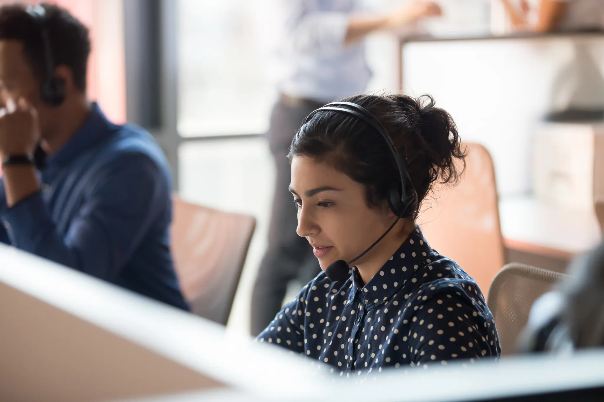 Contact center team working on customer calls