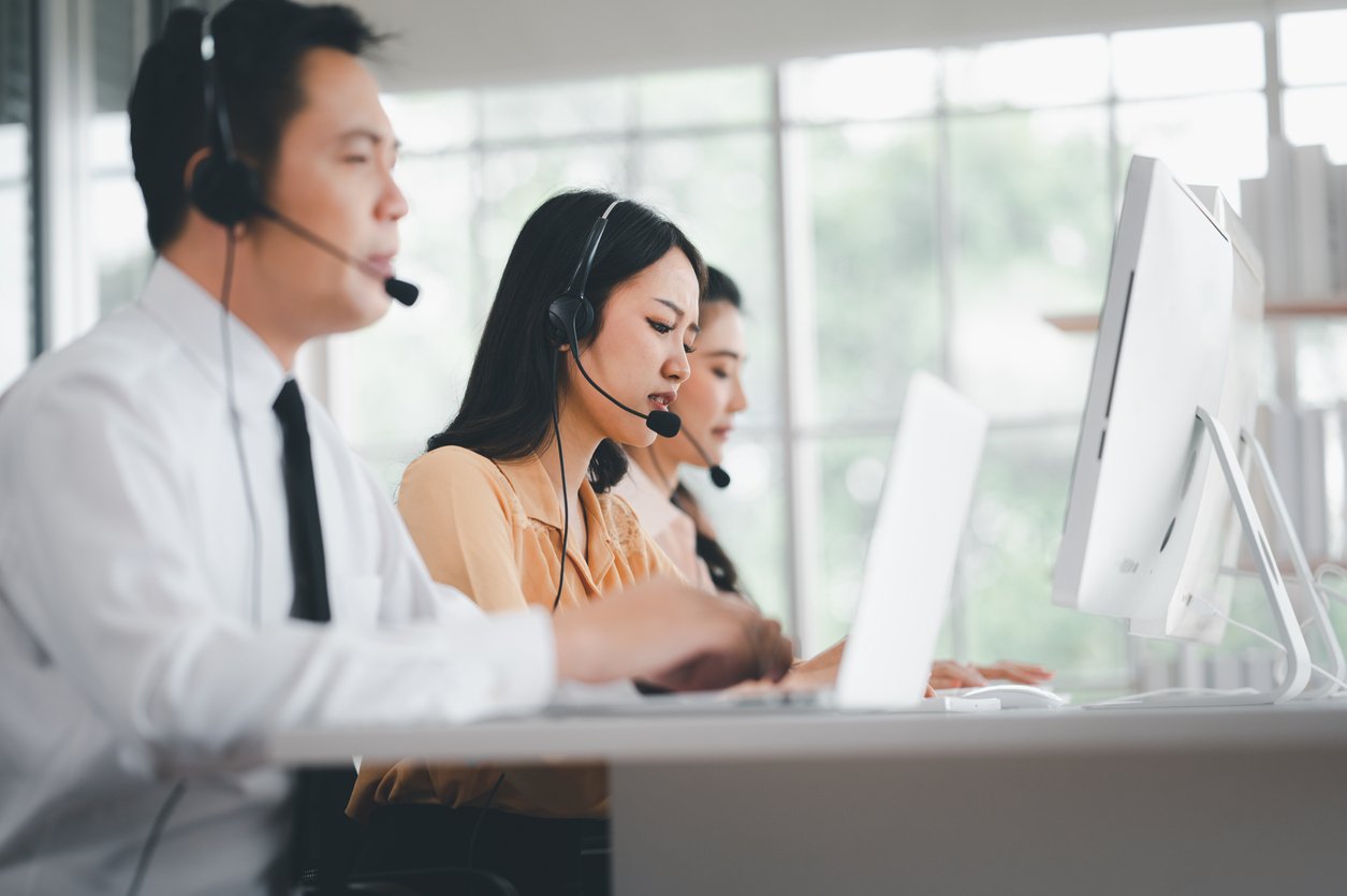 Customer support team speaking with callers